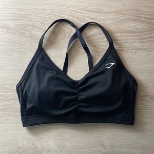 Brand new Ruched Sports Bra from Gymshark, size small in black.
